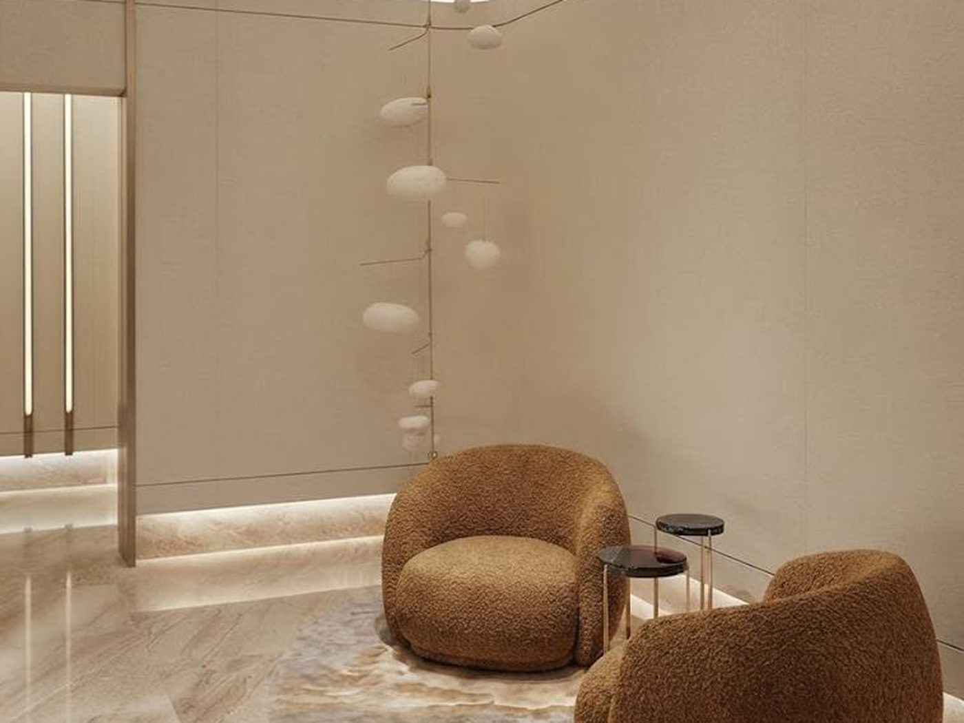 Concept image of a VIP room with two brown boucle chairs, a small side table and a stone floor
